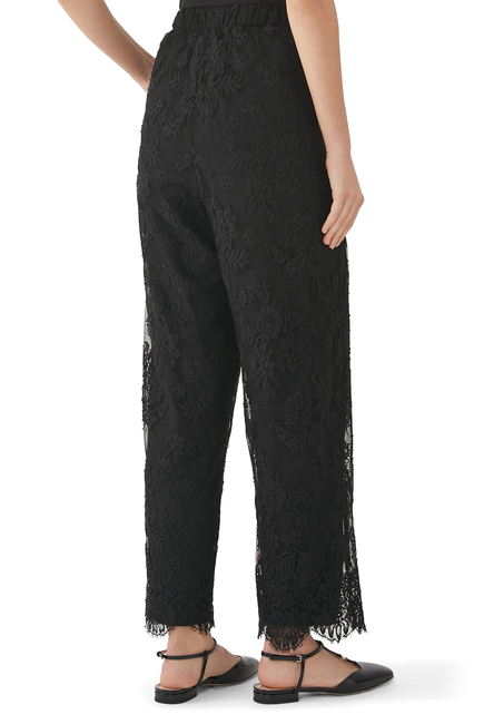 Wide-leg floral lace pants in black - Valentino