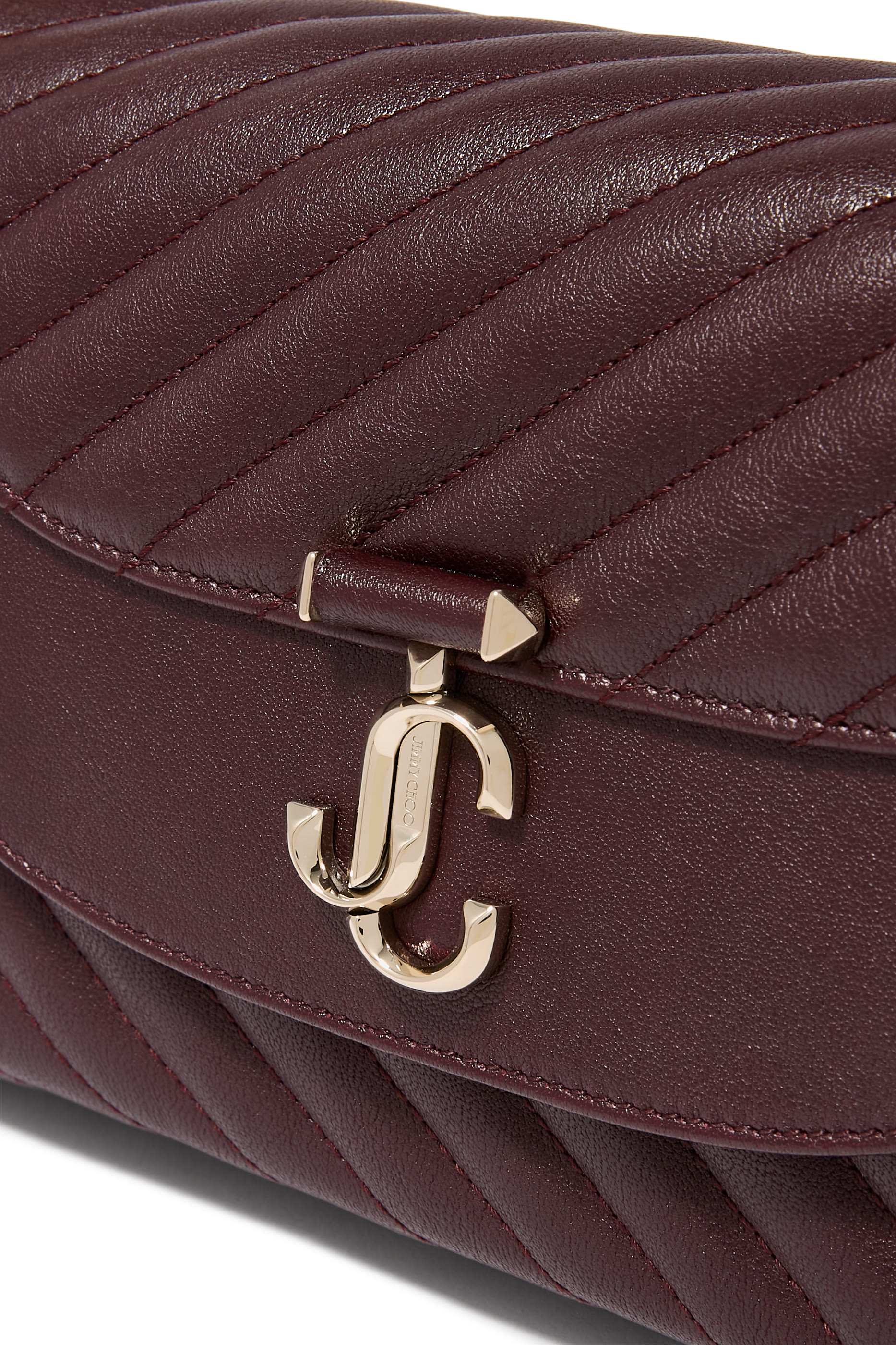 Curve Quilted Biker Leather Top Handle Bag